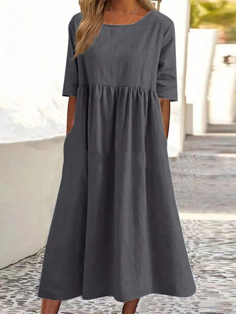 New cotton and linen casual short-sleeved pocket pleated loose round neck dress m300890