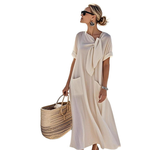 Summer new temperament short-sleeved bow pocket big pendulum loose long dress m302437